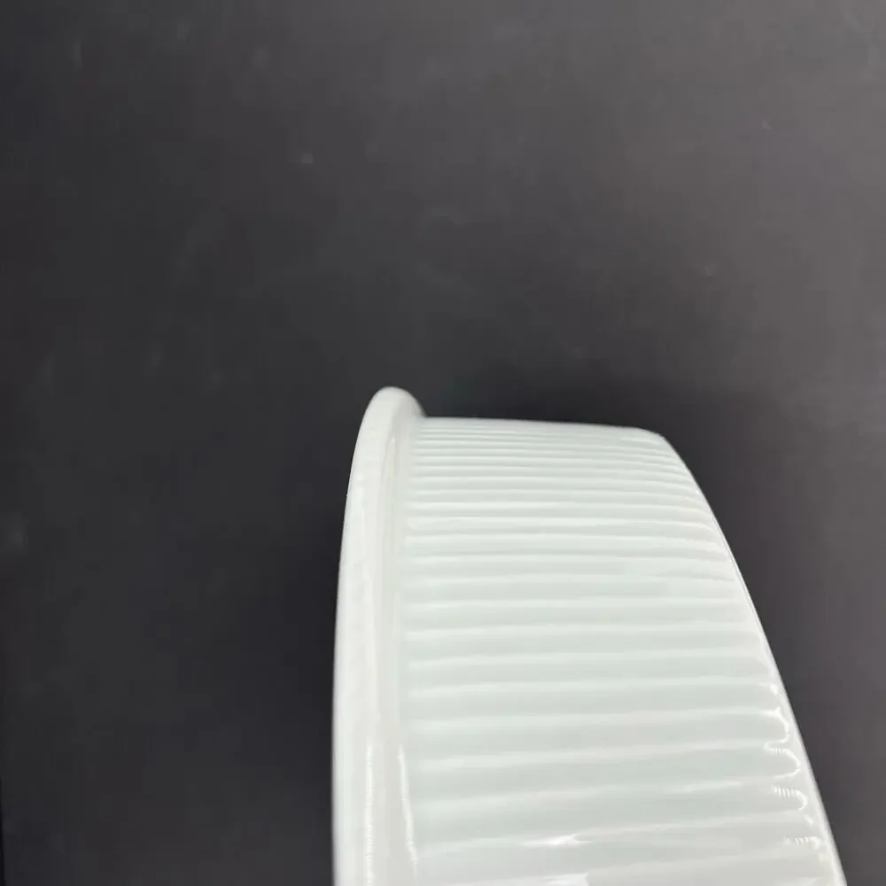 Pillivuyt white ceramic pie quiche baking dish fluted exterior ribbing.